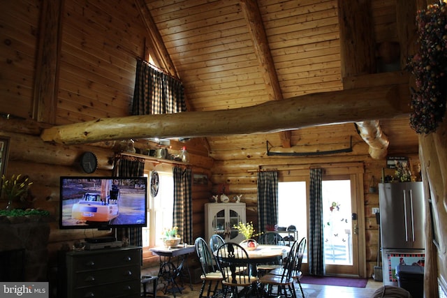 dining room with wooden ceiling, high vaulted ceiling, and beamed ceiling