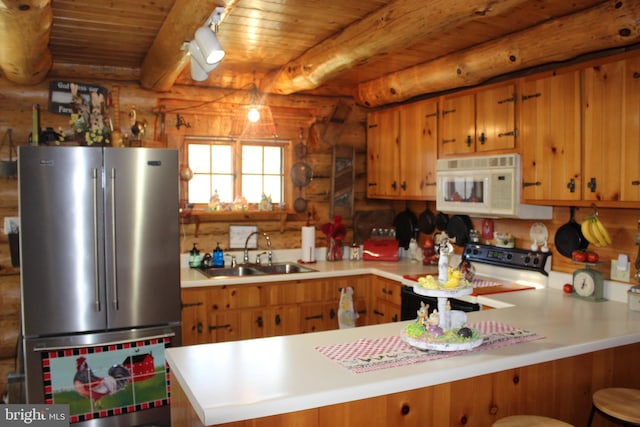 kitchen with wooden ceiling, electric range, a sink, freestanding refrigerator, and white microwave