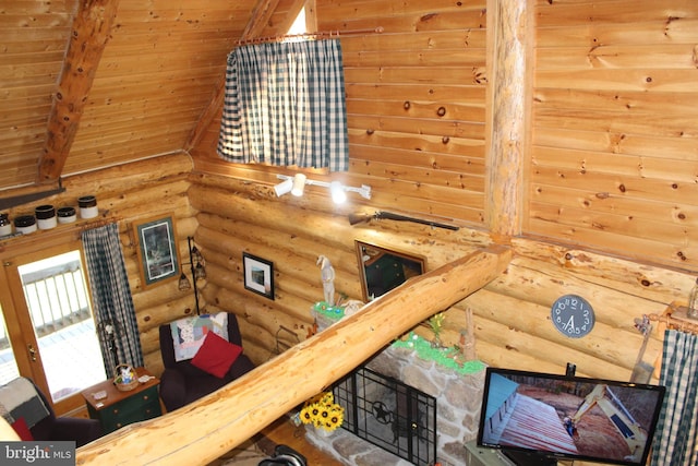staircase featuring beamed ceiling, high vaulted ceiling, and wood ceiling