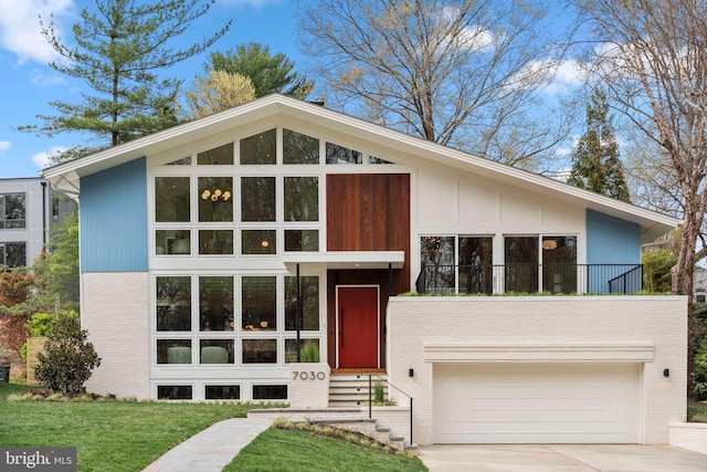7030 Oregon Ave NW, Washington, DC 20015 - view of front of house with an attached garage, a front lawn, driveway, and brick siding
