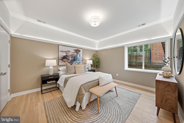 7030 Oregon Ave NW, Washington, DC 20015 - bedroom featuring light wood-style floors, visible vents, and baseboards