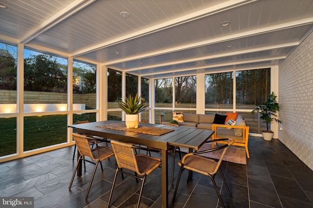 7030 Oregon Ave NW, Washington, DC 20015 - sunroom featuring plenty of natural light, beam ceiling, and outdoor dining space