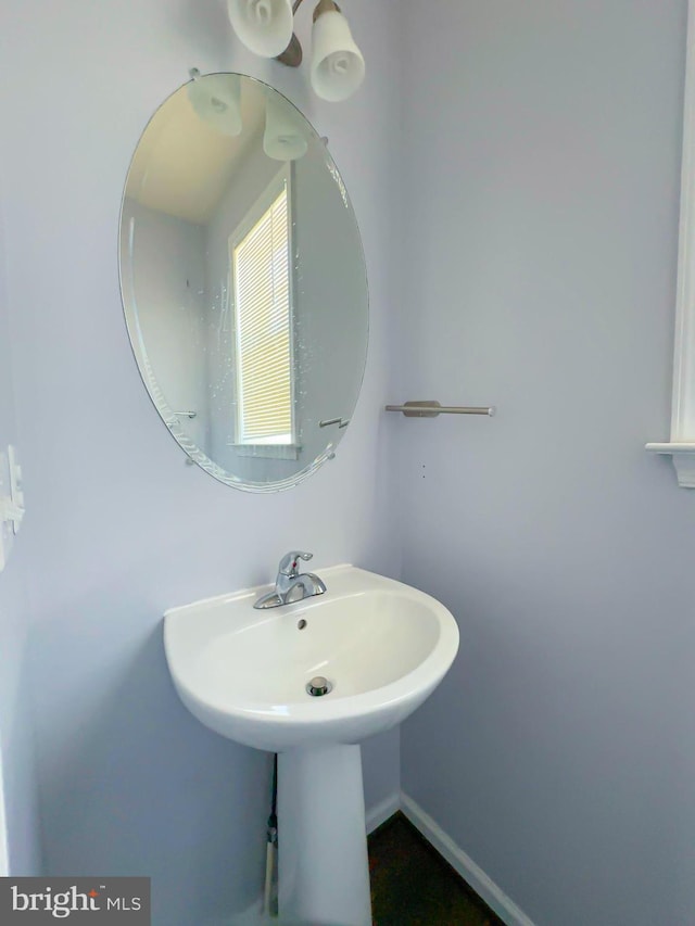 bathroom featuring baseboards