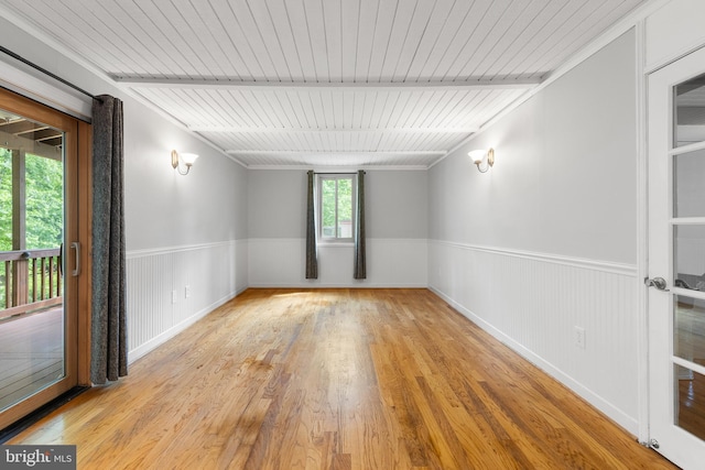 6266 Occoquan Forest Dr, Manassas, VA 20112 - unfurnished room with wood finished floors, wainscoting, and wooden ceiling