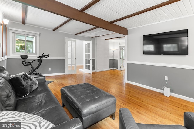 6266 Occoquan Forest Dr, Manassas, VA 20112 - living area with french doors, beam ceiling, wood finished floors, and baseboards