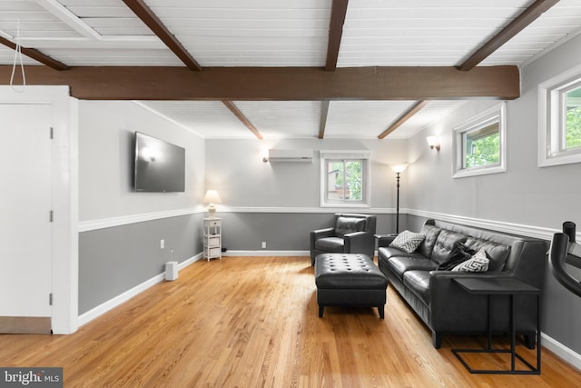 6266 Occoquan Forest Dr, Manassas, VA 20112 - living area with beam ceiling, wood finished floors, healthy amount of natural light, and a wall unit AC