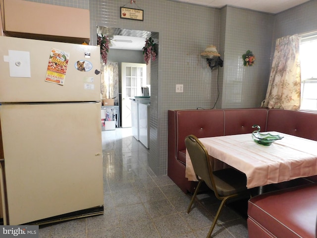 dining room with granite finish floor