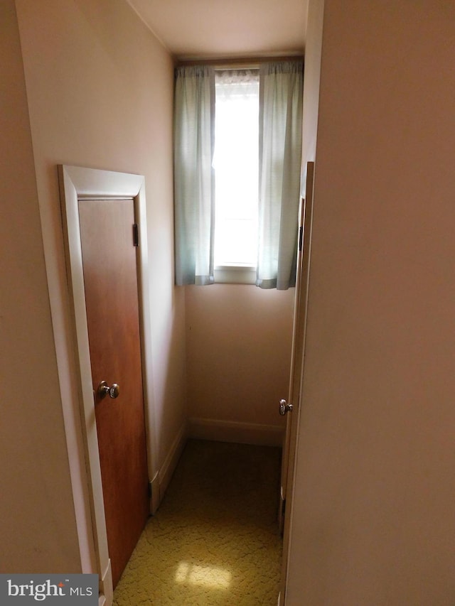 corridor with baseboards