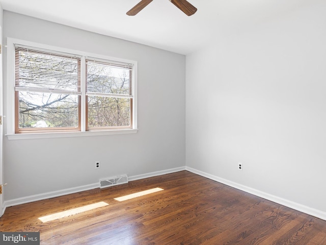 666 Clifton Dr, Bear, DE 19701 - empty room featuring a wealth of natural light, a ceiling fan, wood finished floors, and visible vents