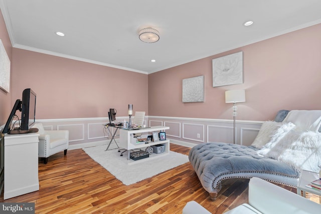 interior space featuring wainscoting, recessed lighting, ornamental molding, and wood finished floors