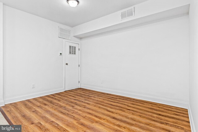 1508 V St SE, Washington, DC 20020 - unfurnished room featuring visible vents, light wood-style flooring, and baseboards