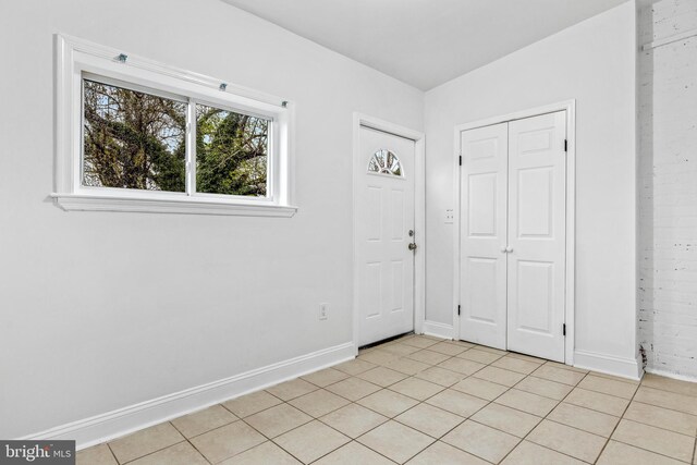 1508 V St SE, Washington, DC 20020 - entrance foyer with light tile patterned floors and baseboards