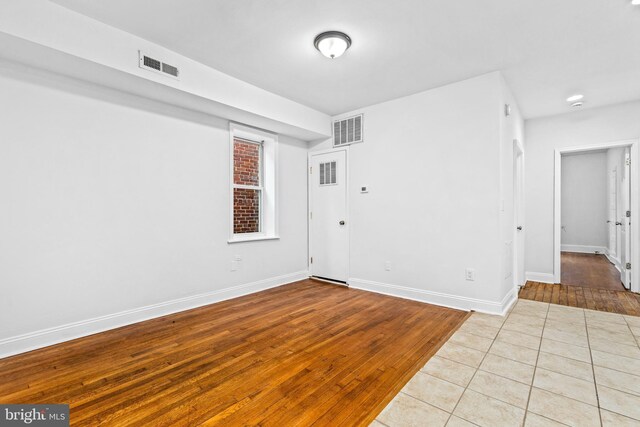 1508 V St SE, Washington, DC 20020 - unfurnished room featuring visible vents, baseboards, and wood finished floors