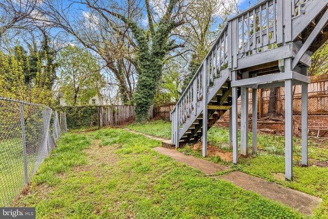 1508 V St SE, Washington, DC 20020 - view of yard with a fenced backyard and stairs