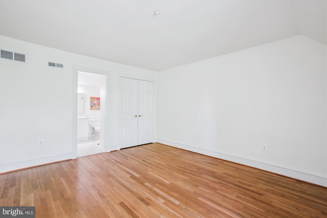 979 Powhatan St, Alexandria, VA 22314 - spare room with baseboards, visible vents, and light wood-style flooring