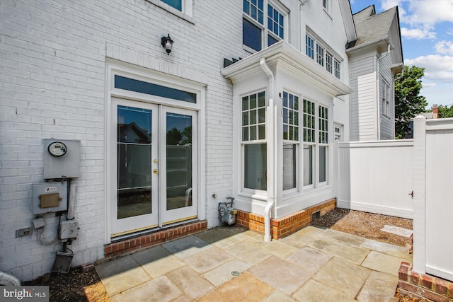 979 Powhatan St, Alexandria, VA 22314 - entrance to property with a patio, fence, and french doors