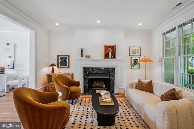 979 Powhatan St, Alexandria, VA 22314 - living room with visible vents, crown molding, a fireplace, wood finished floors, and recessed lighting