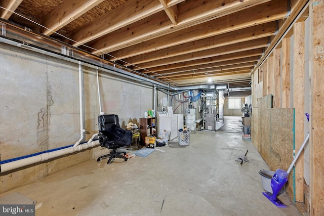 below grade area featuring heating unit and water heater