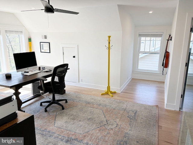 home office with lofted ceiling, light wood-type flooring, baseboards, ceiling fan, and recessed lighting