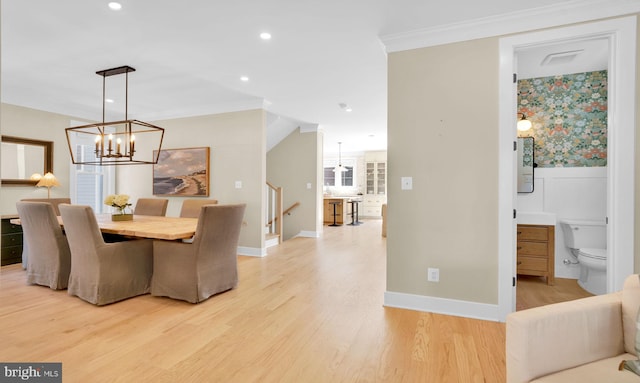 dining room with wallpapered walls, light wood-style flooring, a chandelier, recessed lighting, and baseboards