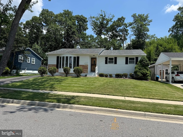243 Ironshire S, Laurel, MD 20724 - ranch-style house with a front yard, a chimney, driveway, and roof with shingles