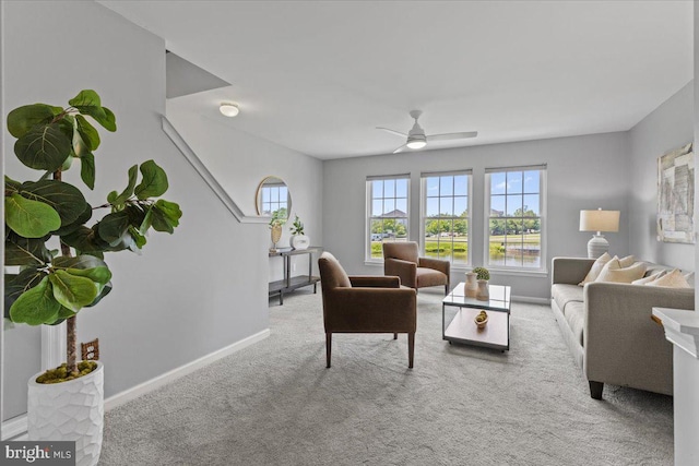 20973 Killawog Ter, Ashburn, VA 20147 - carpeted living room with baseboards and ceiling fan