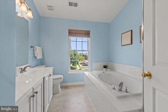 20973 Killawog Ter, Ashburn, VA 20147 - bathroom with vanity, a garden tub, baseboards, toilet, and tile patterned floors