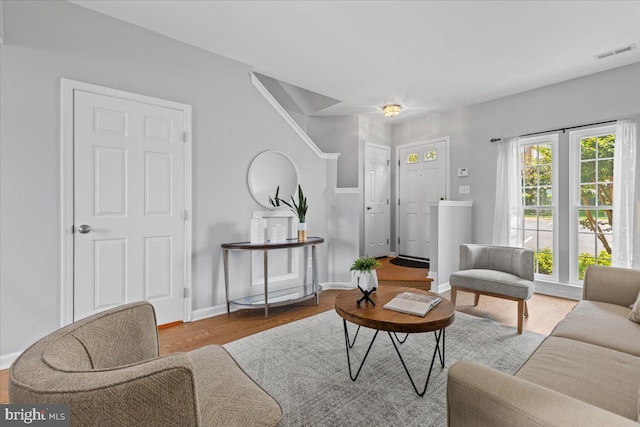 20973 Killawog Ter, Ashburn, VA 20147 - living room featuring wood finished floors and baseboards