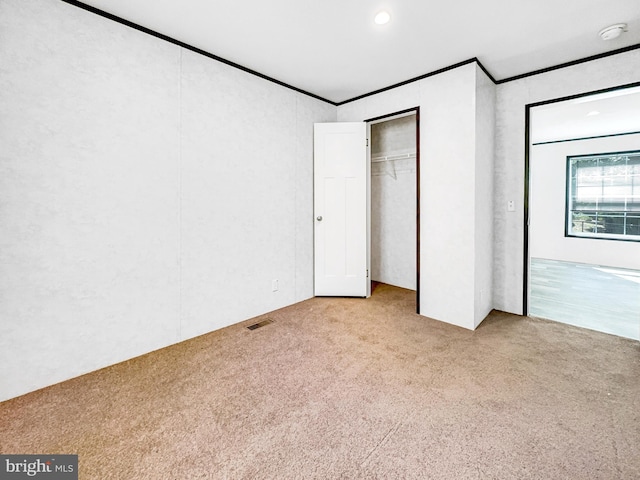 309 Fern Rd, Millville, NJ 08332 - unfurnished bedroom with carpet, a closet, ornamental molding, and recessed lighting