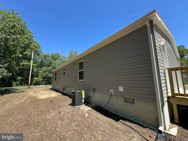 309 Fern Rd, Millville, NJ 08332 - view of home's exterior with central AC and crawl space