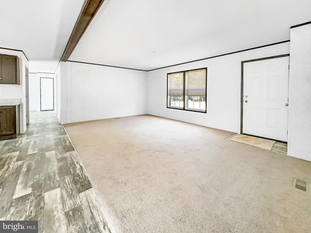 309 Fern Rd, Millville, NJ 08332 - unfurnished living room featuring light carpet