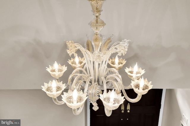 details with an inviting chandelier