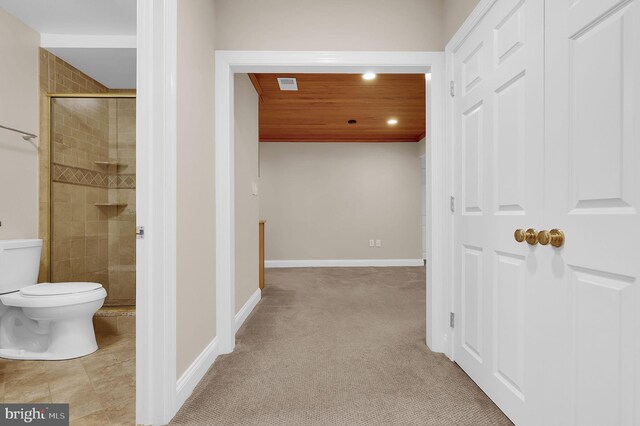 hallway featuring recessed lighting, carpet, baseboards, and visible vents
