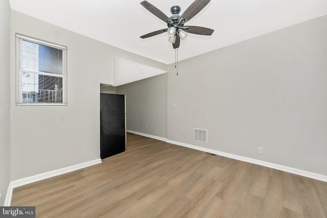 2828 Woodbrook Ave, Baltimore, MD 21217 - unfurnished room with ceiling fan, baseboards, light wood finished floors, and visible vents