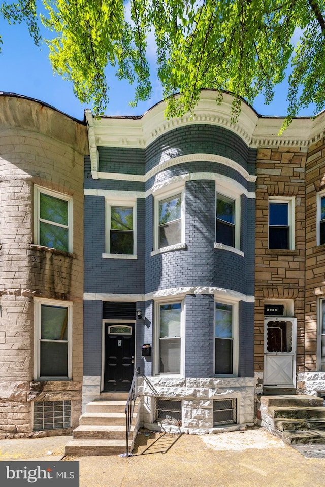 2828 Woodbrook Ave, Baltimore, MD 21217 - view of front of house with stone siding and brick siding