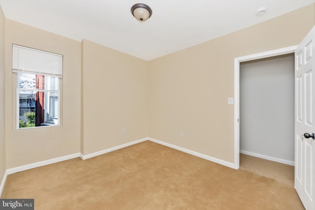 2828 Woodbrook Ave, Baltimore, MD 21217 - unfurnished bedroom featuring baseboards and light colored carpet