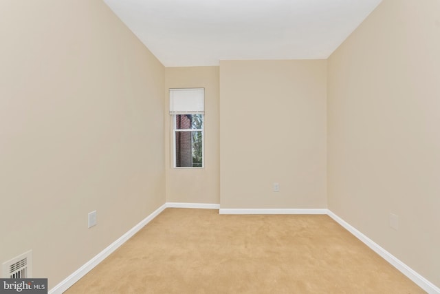 2828 Woodbrook Ave, Baltimore, MD 21217 - empty room with visible vents, light carpet, and baseboards