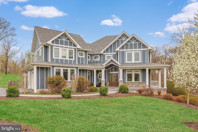 59 N Ridgemont Way, Shepherdstown, WV 25443 - view of front of home featuring stone siding, a front lawn, and a shingled roof