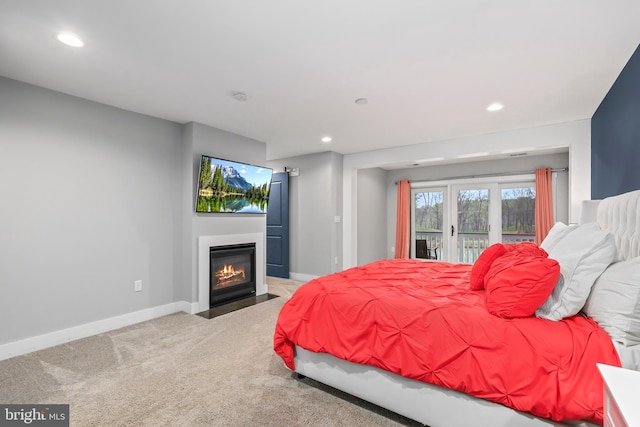 59 N Ridgemont Way, Shepherdstown, WV 25443 - bedroom with access to exterior, recessed lighting, baseboards, carpet flooring, and a fireplace with flush hearth