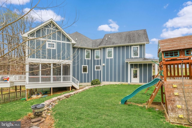 59 N Ridgemont Way, Shepherdstown, WV 25443 - rear view of property with a playground, a sunroom, roof with shingles, and board and batten siding