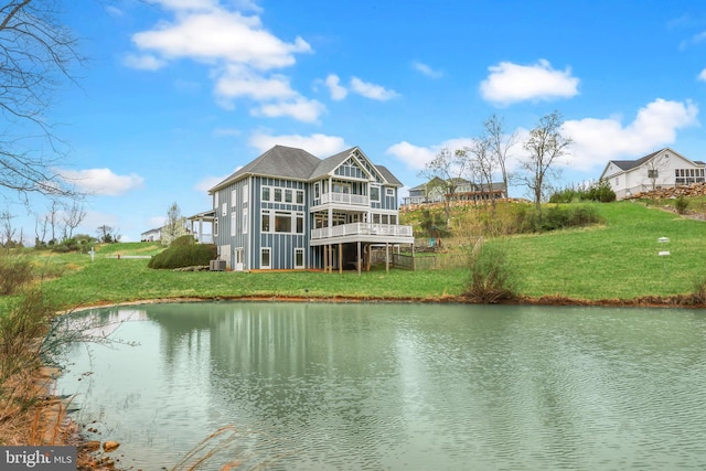 59 N Ridgemont Way, Shepherdstown, WV 25443 - back of property featuring a yard, a deck with water view, central air condition unit, and a shingled roof