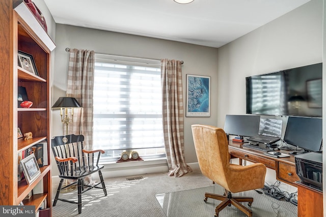 office featuring carpet flooring and visible vents