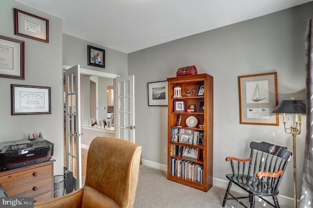 office space with carpet flooring, french doors, and baseboards