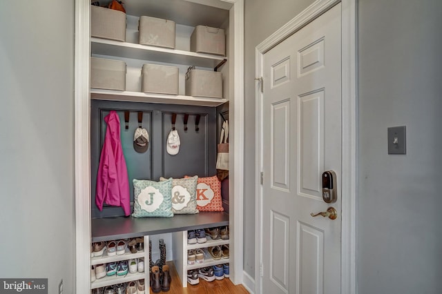 mudroom with wood finished floors