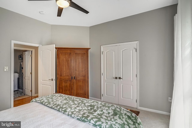 bedroom featuring ceiling fan, carpet flooring, a closet, and baseboards