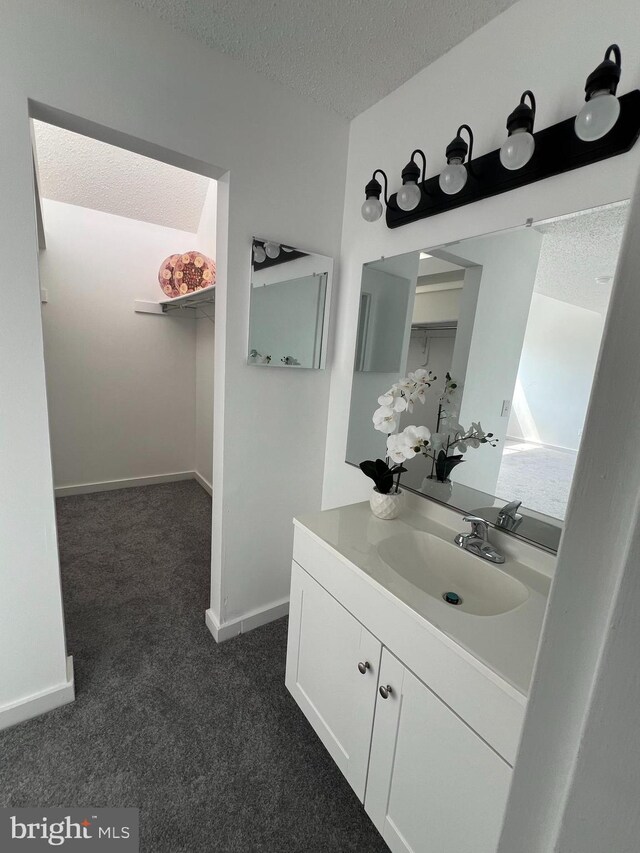 2357 Nutmeg Ter, Baltimore, MD 21209 - bathroom with vanity and a textured ceiling