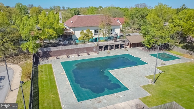 2357 Nutmeg Ter, Baltimore, MD 21209 - view of pool featuring a patio area, a fenced in pool, a lawn, and a fenced backyard
