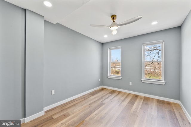 unfurnished room with baseboards, light wood-style flooring, recessed lighting, and a ceiling fan
