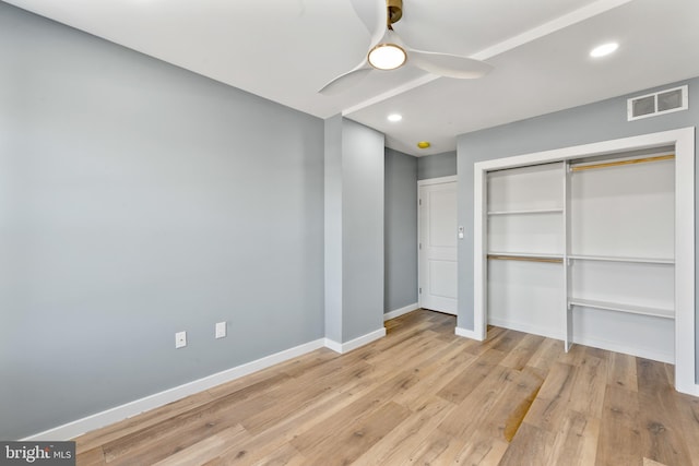 unfurnished bedroom with a closet, visible vents, baseboards, recessed lighting, and light wood-type flooring