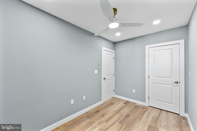 unfurnished bedroom featuring baseboards, light wood-style flooring, recessed lighting, and a ceiling fan